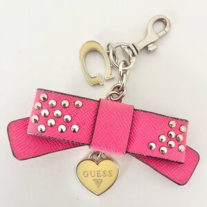 GUESS Fuchsia Bow Keychain with Gold and Silver Accents
